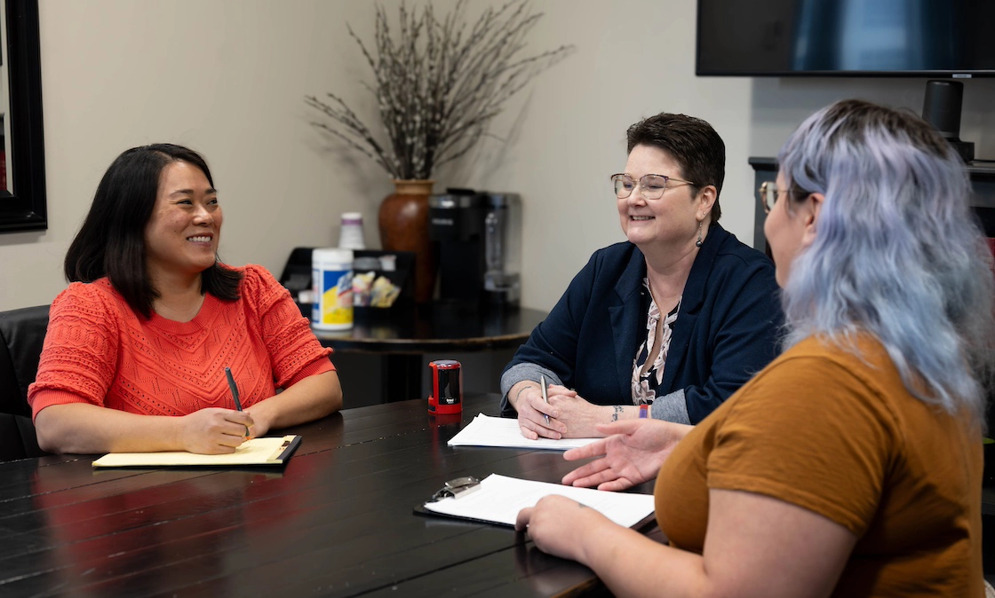 Team members at Janssen Estate Probate & Elder Law discussing estate planning questions during a consultation