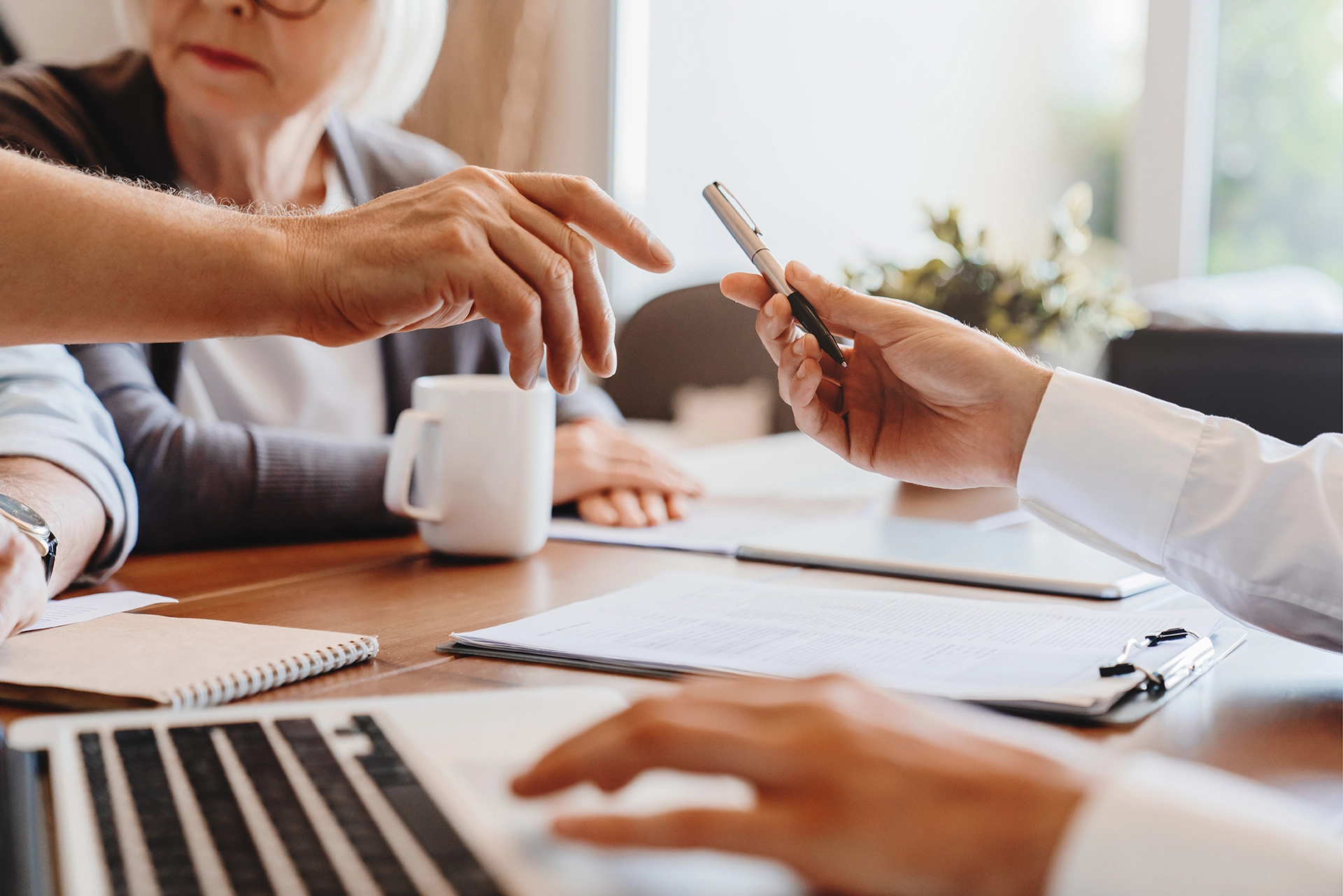 Close-up of family meeting with an attorney to discuss legal guardianship or conservatorship for a loved one